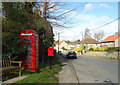 SE7268 : Elizabeth II postbox and telephone box, Welburn by JThomas