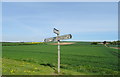 Fingerpost on road junction, Main Road, Weaverthorpe