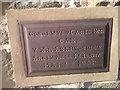 A slate plaque on the memorial hall, Mynydd Llandegai