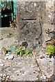 Benchmark on jamb of door of outbuilding at Cowside Farm