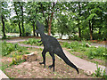 SD8511 : Dinosaur in the Bog Garden at Queen's Park by David Dixon