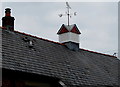 Symbol of wisdom on top of the former village school, Llanfrynach, Powys