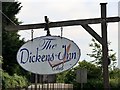 The Dickens Inn sign