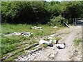 Smashed gate and fly tipping, on Goosey Drove