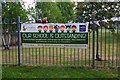 Banner outside St. John the Evangelist Church of England Primary School, Shilton Park, Carterton, Oxon