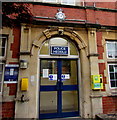 Bilingual name sign at the entrance to Maindee Police Station, Newport