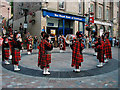 A pipe band in High Street Inverness