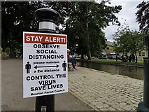 SP1620 : Social distancing notice by the River Windrush by Steve Daniels