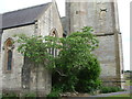 The corner of All Saints in Farmborough