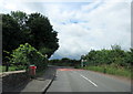 Siddington Road and village sign