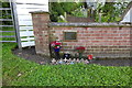 Memorial on a garden wall on North Kelsey Road