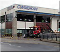 ST2995 : Skip and skip lorry in Cwmbran town centre by Jaggery
