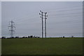 High and low tension pylons