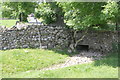 SD9889 : Culvert in wall on south side of A684 by Roger Templeman