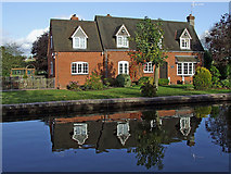 SJ7725 : Canalside house near High Offley, Staffordshire by Roger  D Kidd