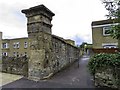 A stone pillar and wall on London Road