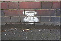 Benchmark on parapet of bridge on SE side of Gulson Road