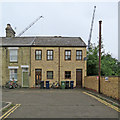 Great Eastern Street: cranes, stench pipe, bins and bikes