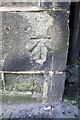 Benchmark on White Lion building, Keighley Road