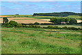 View over farmland toward Chase Barn