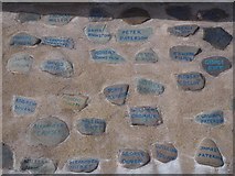 NT9464 : Pebbles at the Eyemouth Community Memorial Wall by Jennifer Petrie