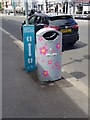 Decorated litter bin and social distancing reminder