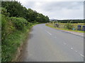 NJ4702 : Road (B9119) at the entrance to Wester Strathweltie by Peter Wood