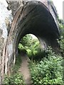 SO9700 : Railway bridge over disused canal by don cload
