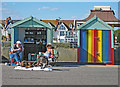 TQ2704 : Hove : beach hut couple with dogs by Jim Osley