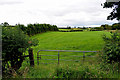 Gate and countryside, Recarson