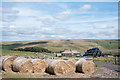 NY8346 : Bales - wrapped and unwrapped by Trevor Littlewood