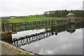 Gulls on footbridge over Lower Laithe Reservoir viewed from Reservoir Road