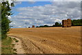 Haystacks in field east of Winterbourne Earls