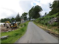 Minor road beside Glenmore River near Galltair