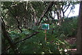 Sign in woodland at Hatchmere