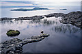 NM4584 : Lochan on the ridge of An SgÃ¹rr, Isle of Eigg by Julian Paren