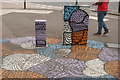 View of pavement art and painted electricity boxes on the corner of Oliver Road and Ruckholt Road