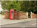 K6 telephone kiosk and wall and gate to Dunham House