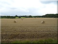 Stubble field with bales near Mile House Farm