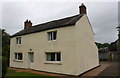 House on north side of A689 in Crosbymoor