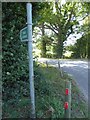 Footpath sign pointing the way to Dedisham