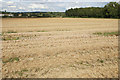 SP2521 : Harvested field near Bledington by Bill Boaden