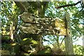 Footpath signpost by Mill Farm