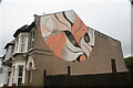 TQ3887 : View of a mural on the side of a house on Grove Green Road by Robert Lamb