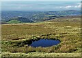 SK0794 : The pool on Shelf Moor - looking towards Glossop by Neil Theasby