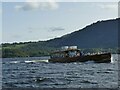 NY2521 : Passing boat on Derwentwater by Stephen Craven
