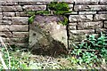 Boundary stone on east side of B6412 opposite Scatterbeck House