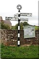 Cumberland County Council signpost and noticeboard at cross roads in Salked Dykes