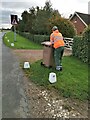 Council worker with wheelie bin, Eastrington