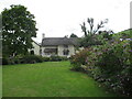 The Royal Oak Inn from across the green, Winsford, Somerset